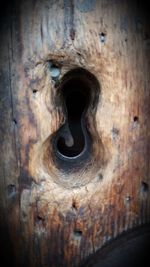 Close-up of hole in wood