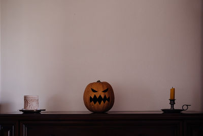 View of pumpkin on table against wall at home