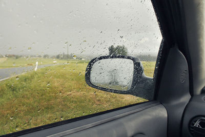 Close-up of wet car window