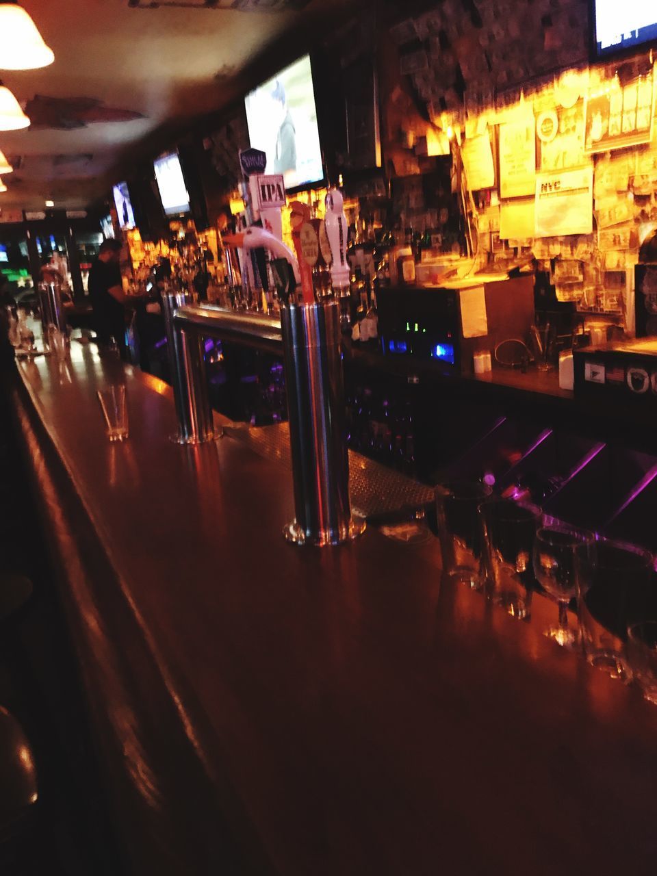 VIEW OF BOTTLES ON TABLE IN RESTAURANT