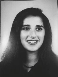 Portrait of smiling young woman at home