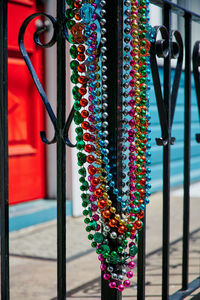 Close-up of multi colored decoration hanging on metal structure
