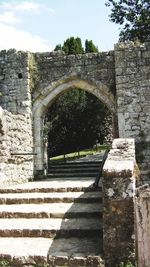 Low angle view of stone wall