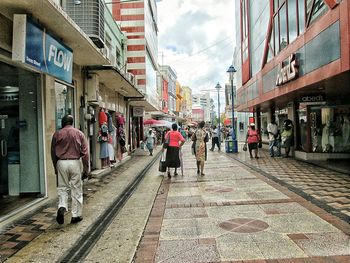 People walking on city street