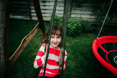Portrait of a smiling girl in playground