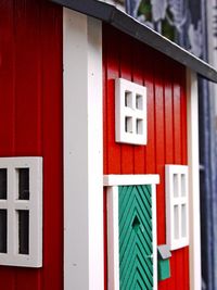 Close-up of red door of house