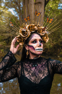 Portrait of young woman wearing mask