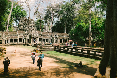 People in front of historical building