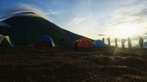 Tent on field against sky
