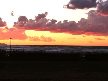 Scenic view of beach during sunset