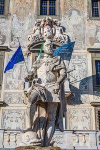 Low angle view of statues on building