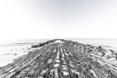 Scenic view of sea against clear sky