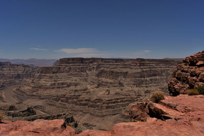 Rock formations in desert against sky