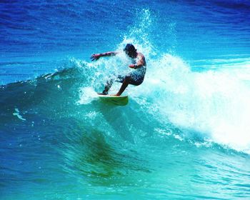 Man surfing at sea