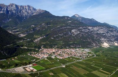 High angle view of buildings and mountains against sky