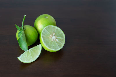 Close-up of lemon slice on table