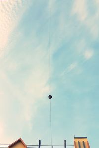 Low angle view of street light against sky