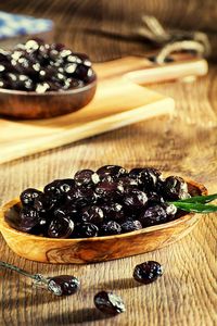 Close-up of black fruits on table