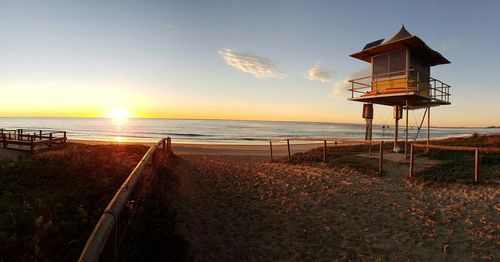 Scenic view of sea at sunset