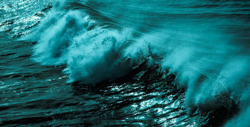 Full frame shot of waves splashing water