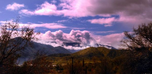 Low angle view of silhouette mountain against sky