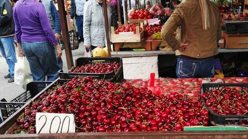 People at market stall