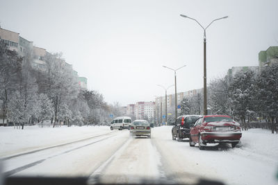 Cars on street in winter