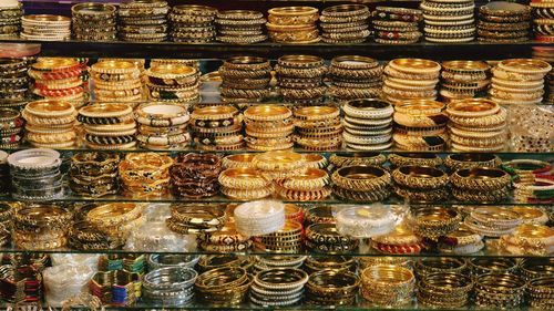 Full frame shot of various bangles for sale in store