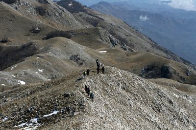 High angle view of people standing on mountain