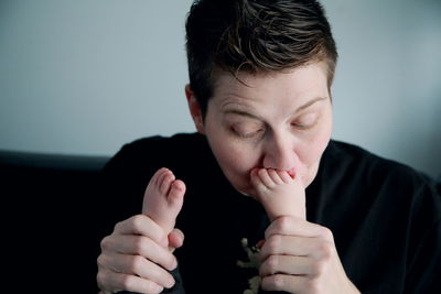 Close-up of woman holding hands