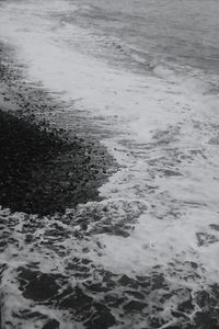 Close-up of waves on beach