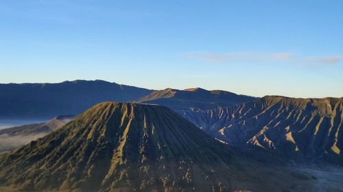 Panoramic view of volcanic landscape against sky