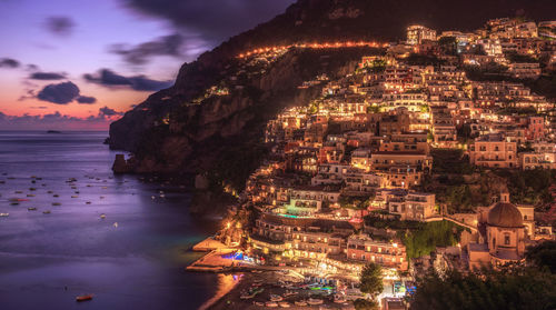 High angle view of illuminated cityscape at night