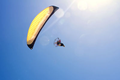 Low angle view of kite flying in sky