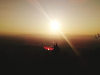 Scenic view of silhouette landscape against sky during sunset