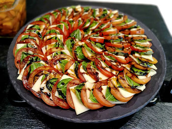 High angle shot of caprese salad on platter