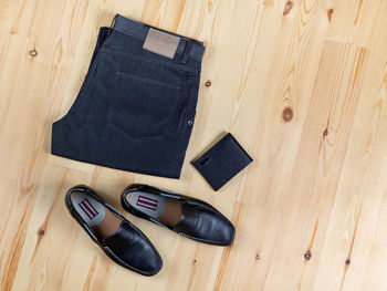 High angle view of shoes on hardwood floor