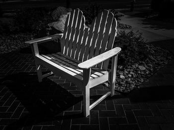 High angle view of empty bench in park