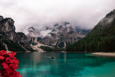 Lake lago di braise in north italy with mountains and clouds in the background 