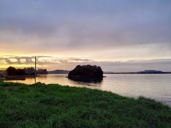 Scenic view of sea against sky during sunset