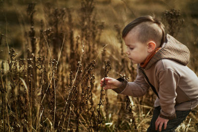 Little boy in the grass