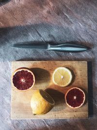 Directly above shot of fruits on cutting board