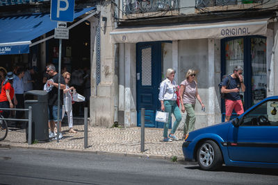 People on street in city