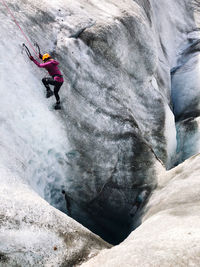 Person standing on rock