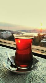 Close-up of drink on table against clear sky