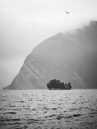 Scenic view of sea against clear sky. monte isola. iseo lake, italy.