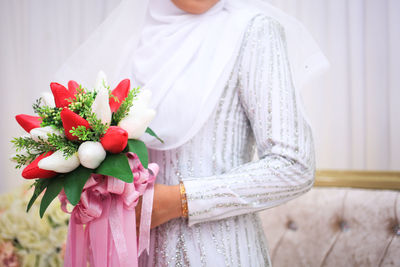 Bride. bride holding a bouquet of flowers.