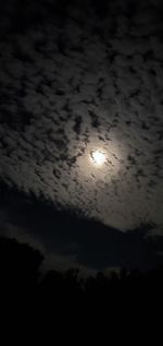 Low angle view of silhouette moon against sky during sunset