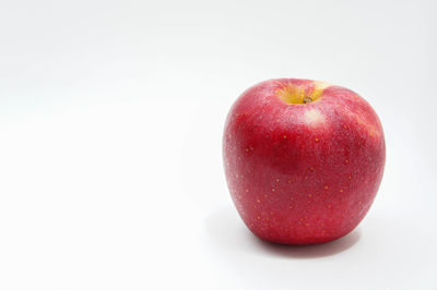 Close-up of apple against white background