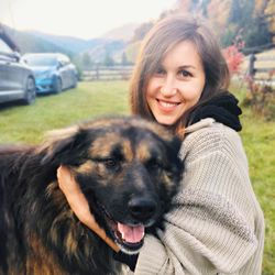 Portrait of woman with dog